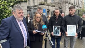 The Fitzpatrick family with Callan Tansey solicitor Niamh Ni Mhúrchú outside the court